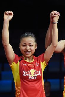 COPENHAGEN, DENMARK - AUGUST 31: Chen Xu and Jin Ma of China on the podium receiving their silver medal in the mixed double against Nan Zhang and Yunlei Zhao of China in the finals during the Li-Ning BWF World Badminton Championships at Ballerup Super Arena on August 31, 2014 in Copenhagen, Denmark. (Photo by Lars Ronbog/FrontZoneSport via Getty Images)